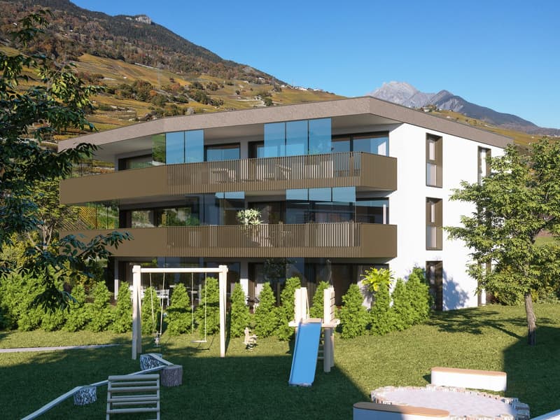 Modern apartment building with 3 floors, glass balconies, green lawn, playground, mountain view