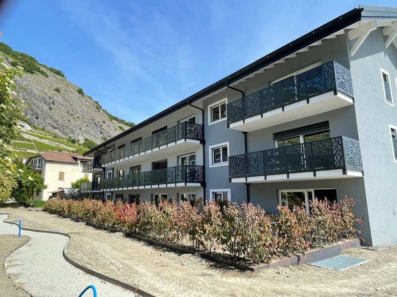 SUPERBE 2.5P NEUF AVEC BALCON-CHARGES COMPRISES- SITUATION IDÉALE À ARDON AVEC PARKING INTERIEURE (3)