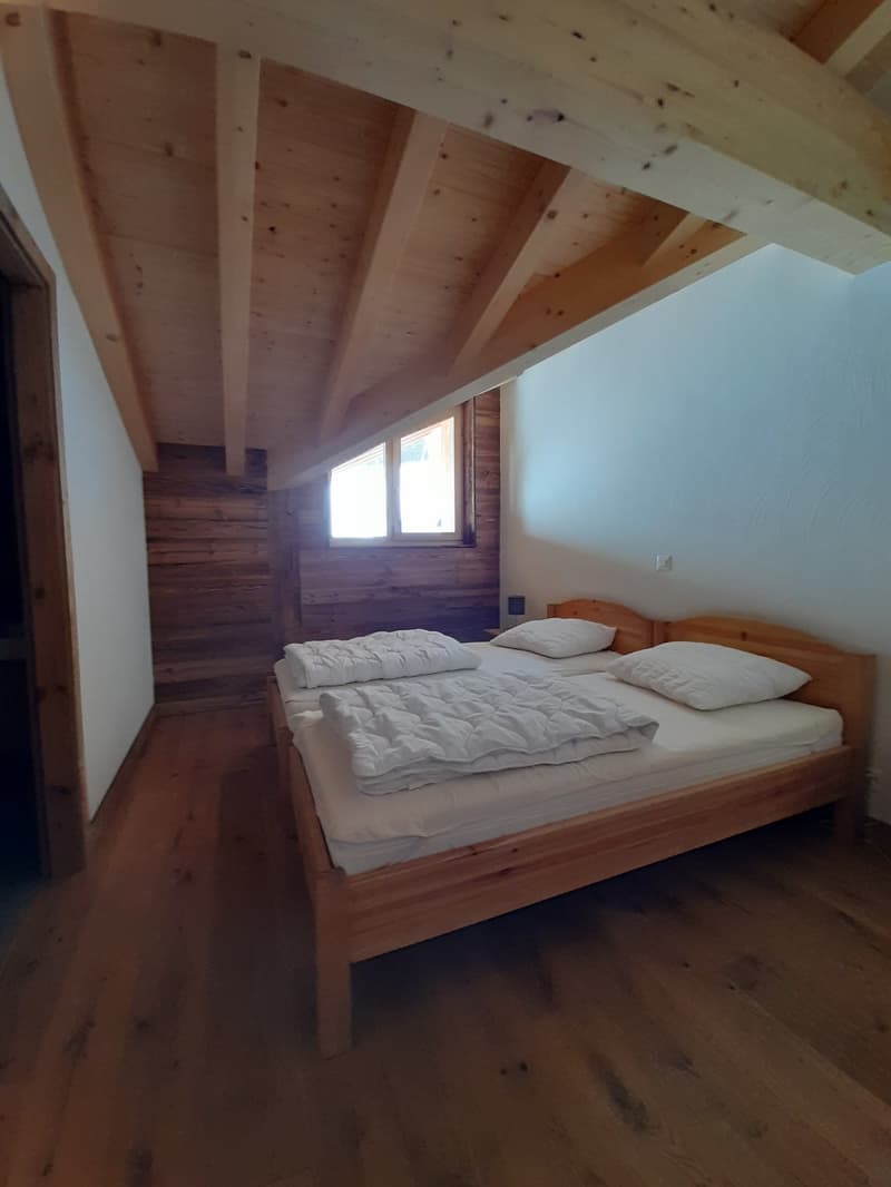 bedroom with wooden beds and wooden ceiling