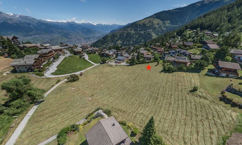 Large empty plot of land with alpine scenery and mountain views
