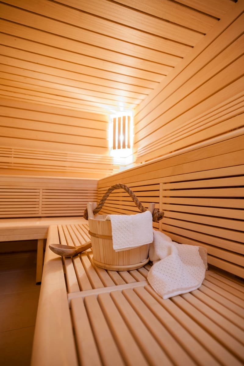 Wooden benches, wooden bucket, towels, wooden interior, wooden lighting