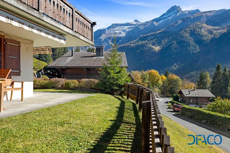 Wooden chalet, balcony, wooden fence, lush greenery, mountainous landscape