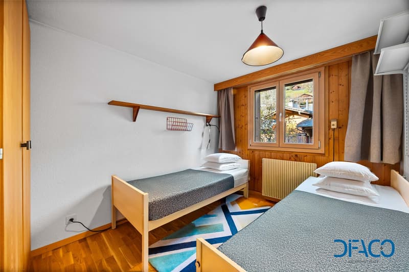 wooden floor, wooden bed, single bed, curtains, heater, window, wooden wall, outlet