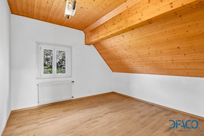 empty room, wooden ceiling, white walls, wooden floor, white radiator, window