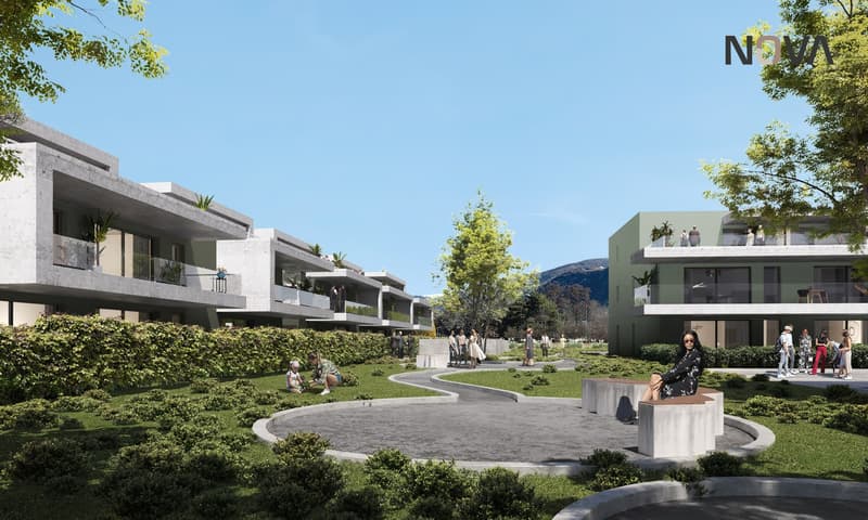 Modern apartments with balconies, landscaped garden, pathways, and a green area for recreation