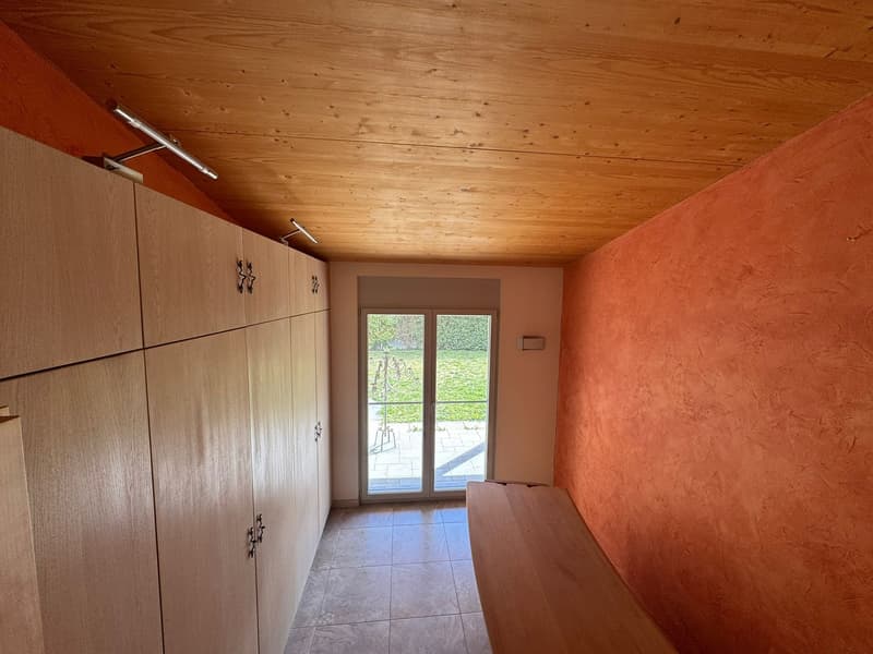 wooden ceiling, wooden floor, wooden bench, wooden cabinets, glass door, outdoor view