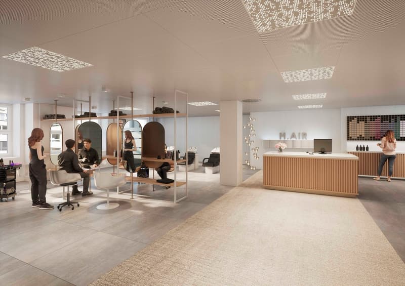 Beauty salon, white walls, gray floors, tiled floor, reception desk, chairs, mirrors, people sitting, floral arrangement on counter, ceiling design