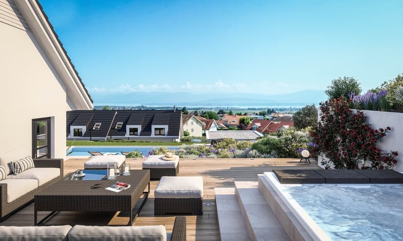 A wooden deck with furniture, a pool, plants, and a view of the town