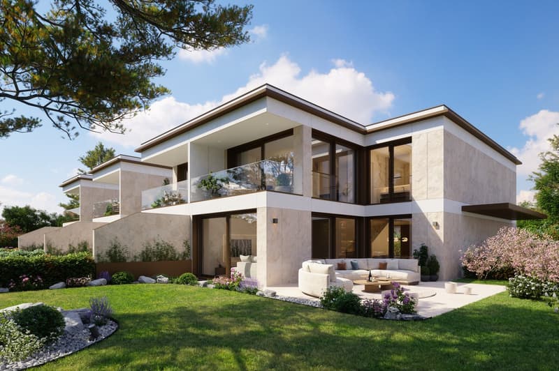 modern style 2-story house, beige stone exterior, large glass windows, raised ground floor, balcony with metal railing, glass door entrance, lush green grass, plants, shrubs, and flowers