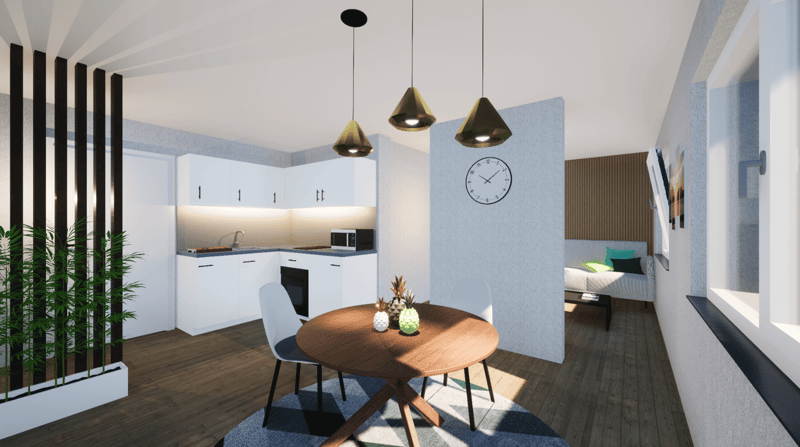 Dining area with a round wooden table, two chairs, a microwave, a sink, a faucet, a clock, a bed, and a couch