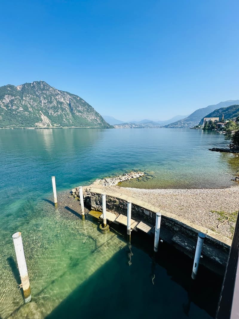 lake view, mountains, pier, clear water, rocks