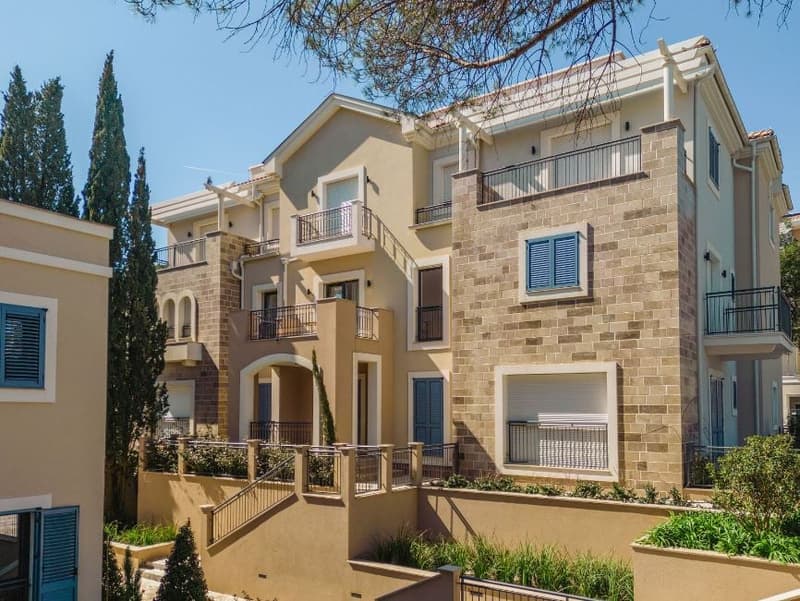2 story house, brick, balconies, garden, trees