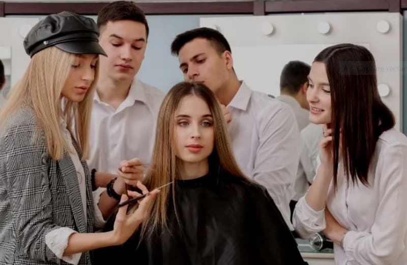 An interior image of a beauty salon with clients getting their hair done.