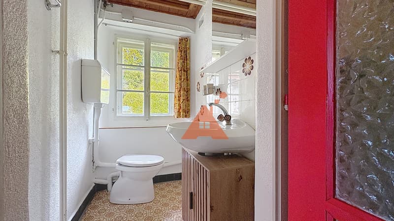 Appartement avec jardin et place de parc, au centre du village (5)