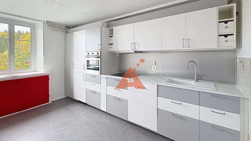 Appartement avec jardin et place de parc, au centre du village (4)