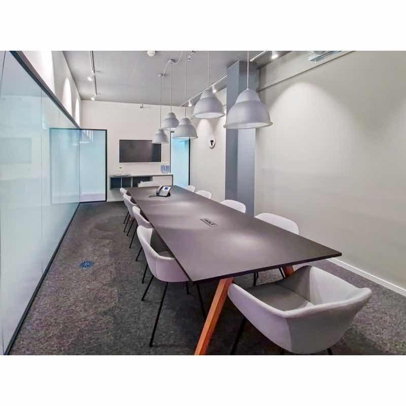 Long table, chairs around, modern design, white walls, modern lamps
