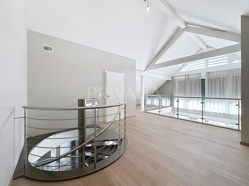 Minergie attic duplex of 135 m² with balcony and fireplace in Mies (4)