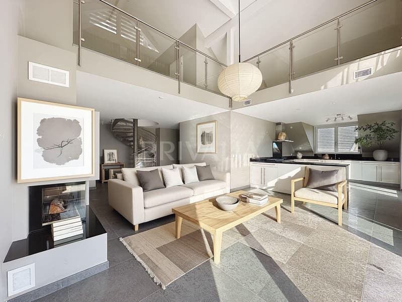 Minergie attic duplex of 135 m² with balcony and fireplace in Mies (2)