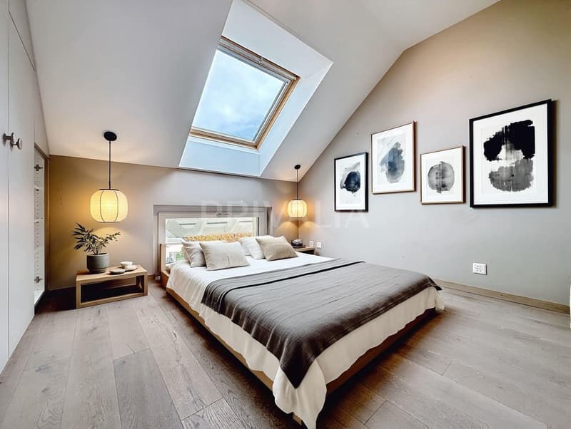 Minergie attic duplex of 135 m² with balcony and fireplace in Mies (3)