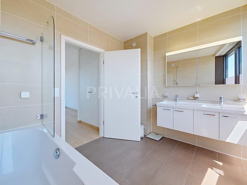 Eccezionale attico in duplex con vista panoramica sul lago e le montagne (8)