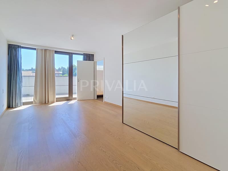 Eccezionale attico in duplex con vista panoramica sul lago e le montagne (4)