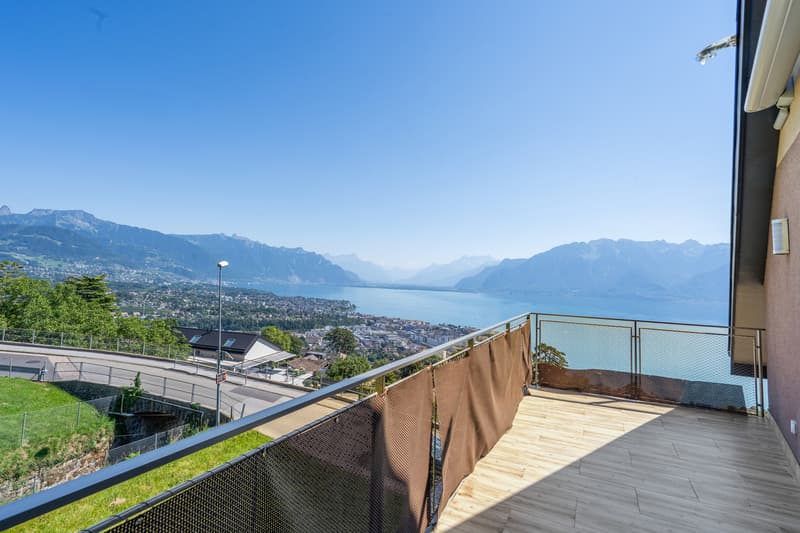 Appartamento di prestigio rinnovato con vista spettacolare sul lago! (5)