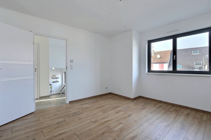 Maison résidentielle moderne durable – Style, confort et mobilité aux portes de Bâle (24)