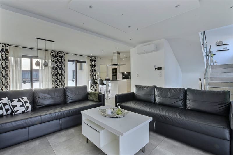 Maison résidentielle moderne durable – Style, confort et mobilité aux portes de Bâle (1)
