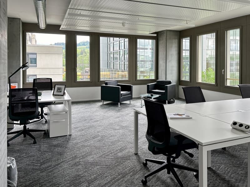 modern office space with windows, chairs, desks, gray carpet, outdoor view