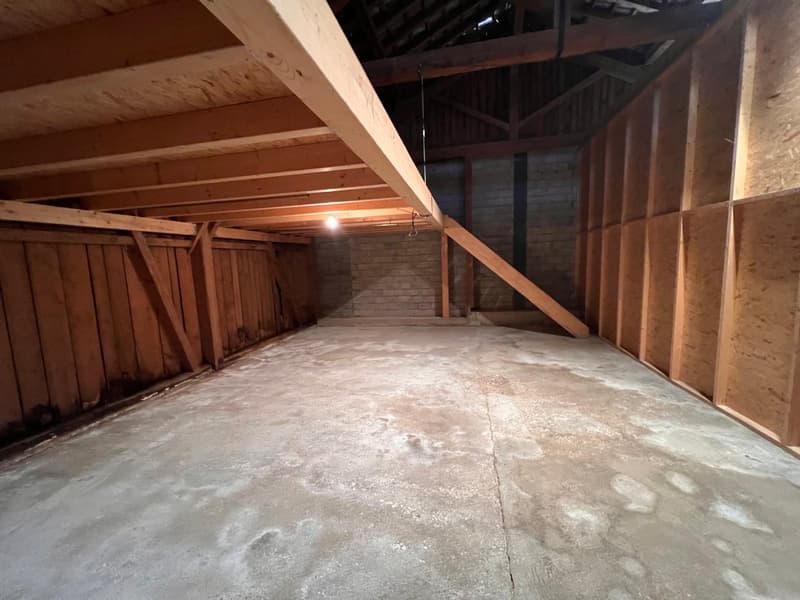 empty room, wooden beams, concrete floor, brick wall, wooden wall