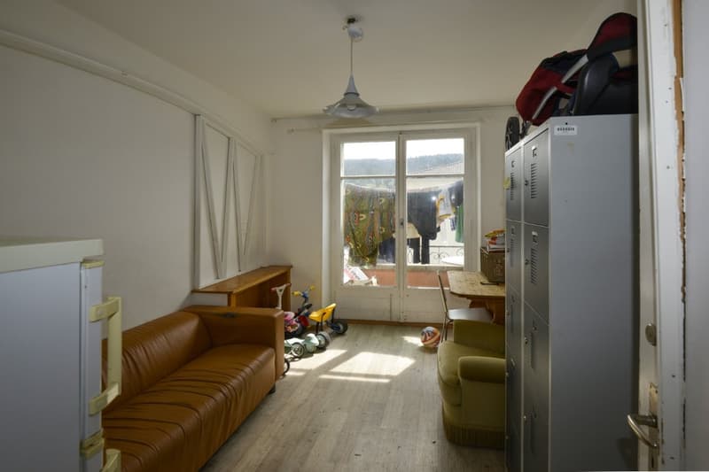 Immeuble locatif de 15 pièces au centre de Tramelan (10)