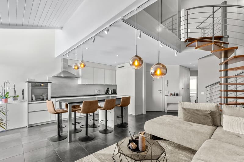 Elegance and comfort for this duplex attic with a view of the lake and the Alps (4)