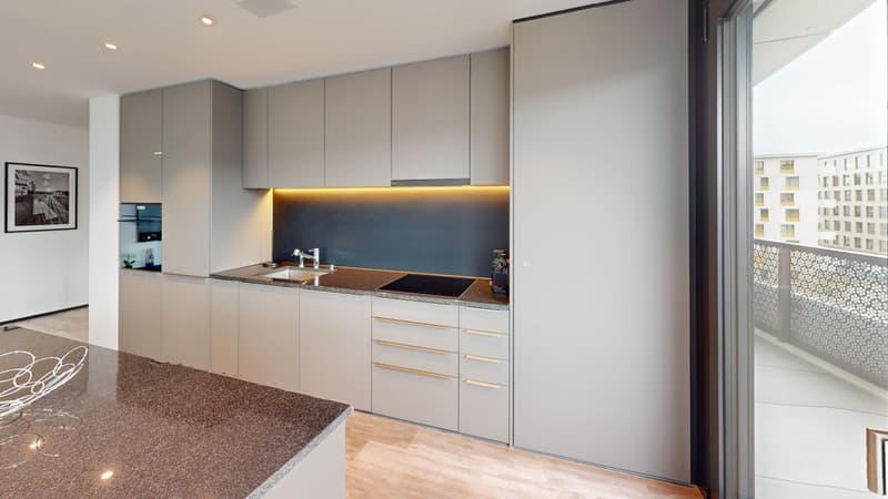 modern kitchen with granite countertops, modern cabinets, sink with faucet, induction stove, refrigerator