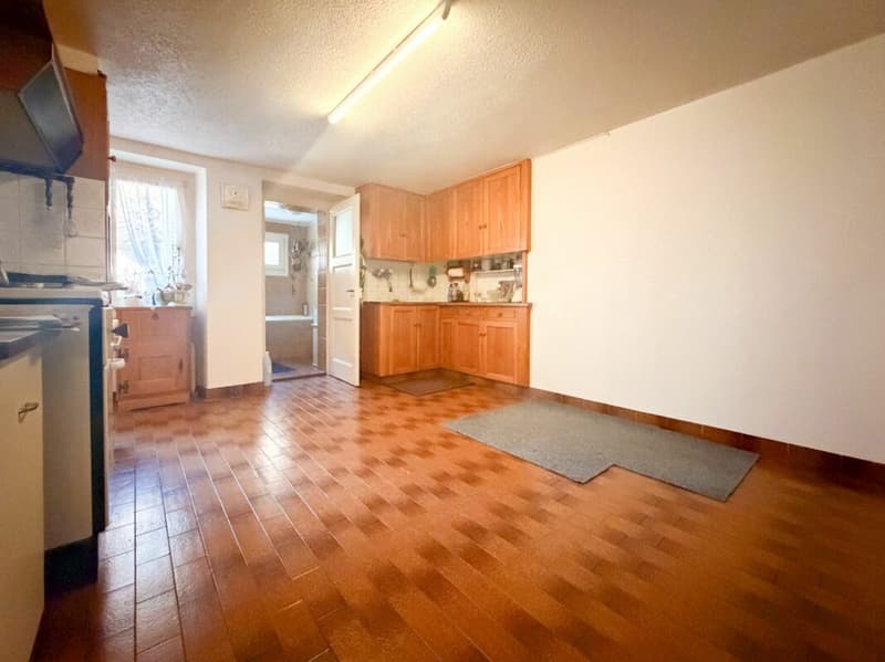 Village house with multiple apartments in the center of Chippis (6)