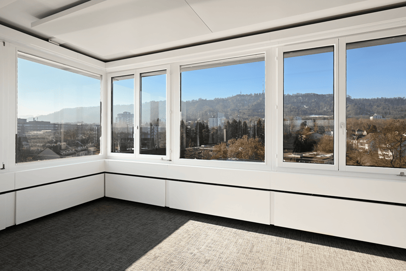large windows, city view, modern design, white walls, gray floor
