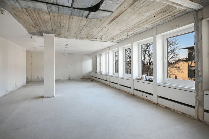 empty room, large windows, white walls, ceiling pipe, white floor