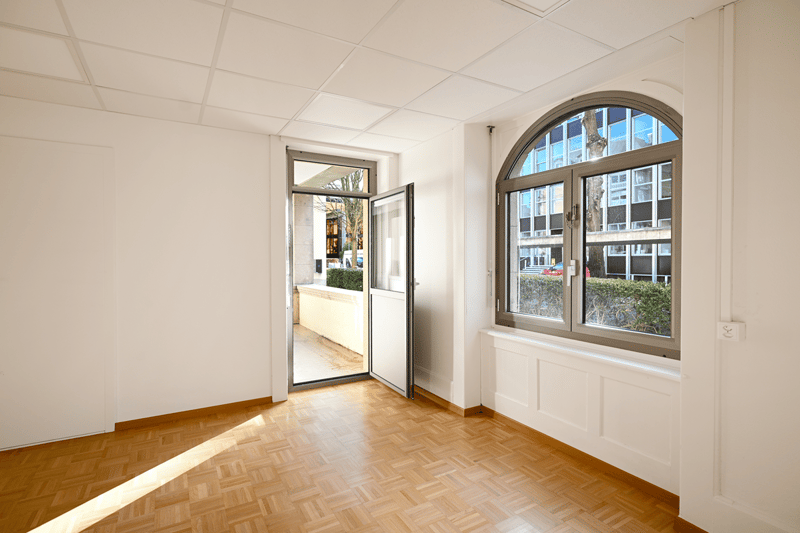 empty room, wooden floor, white walls, arch window, glass door, hallway