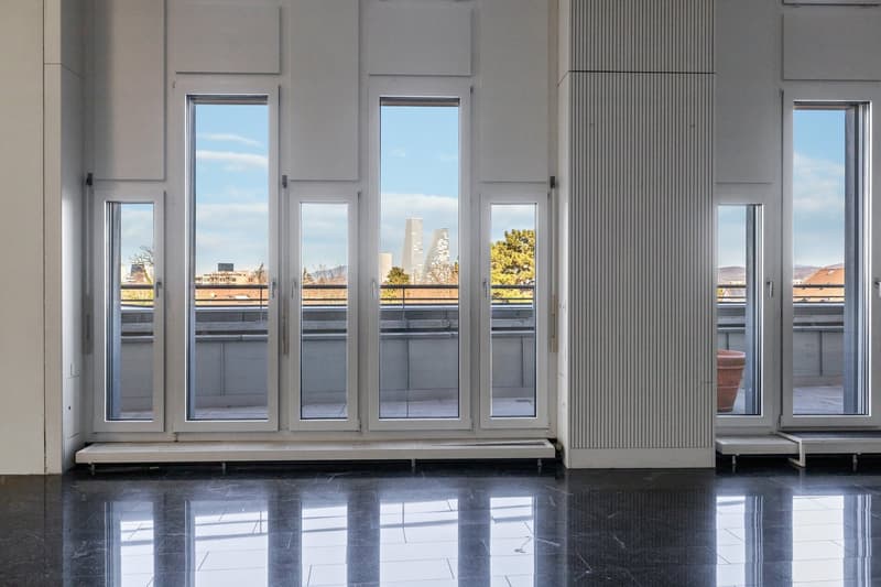 Floor to ceiling windows, balcony, black marble flooring