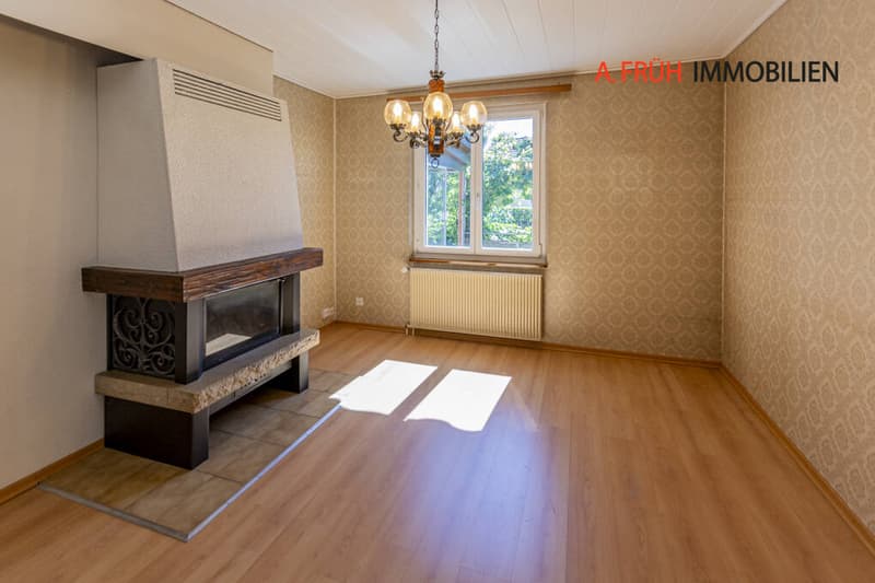 Wohnzimmer mit Cheminée