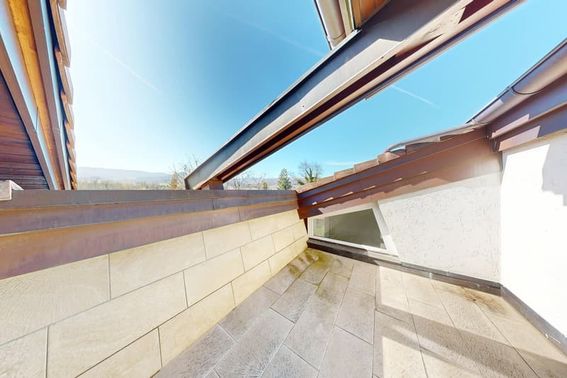 tiled floor, large windows, view of mountains, metal railings