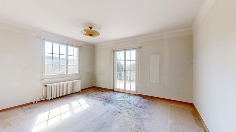 empty room, white walls, white ceiling, white radiator, two windows, sliding glass door, balcony