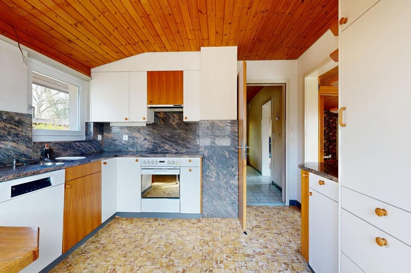 kitchen with granite countertops, wooden cabinets, white appliances, wooden ceiling