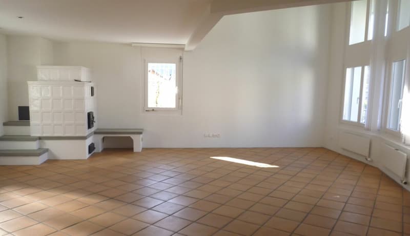 Wohnzimmer mit Kachelofen