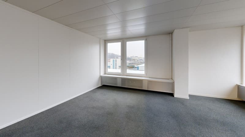 modern office room, white walls, gray floor, large window with view of the city