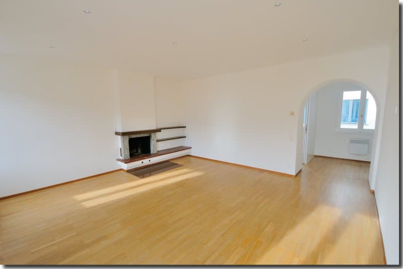 empty room, fireplace, wooden floor, white walls