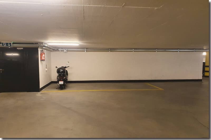 Empty parking space for motorcycles with entrance from the left side