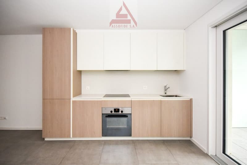 modern kitchen, white cabinets, wooden countertops, stainless steel appliances, modern sink and faucet