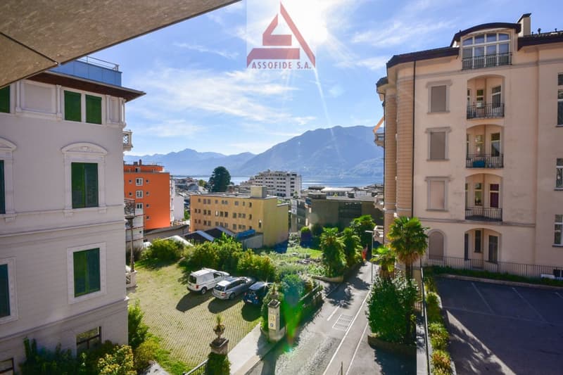 buildings, green grass, cars, mountains, terrace
