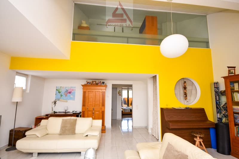 modern living room with yellow wall, white leather sofas, piano, wooden cabinet, bookshelf, lamps, table with lamp