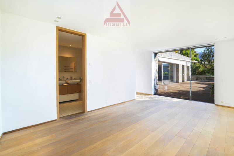 empty room, wooden floor, white walls, sliding glass door, wooden balcony